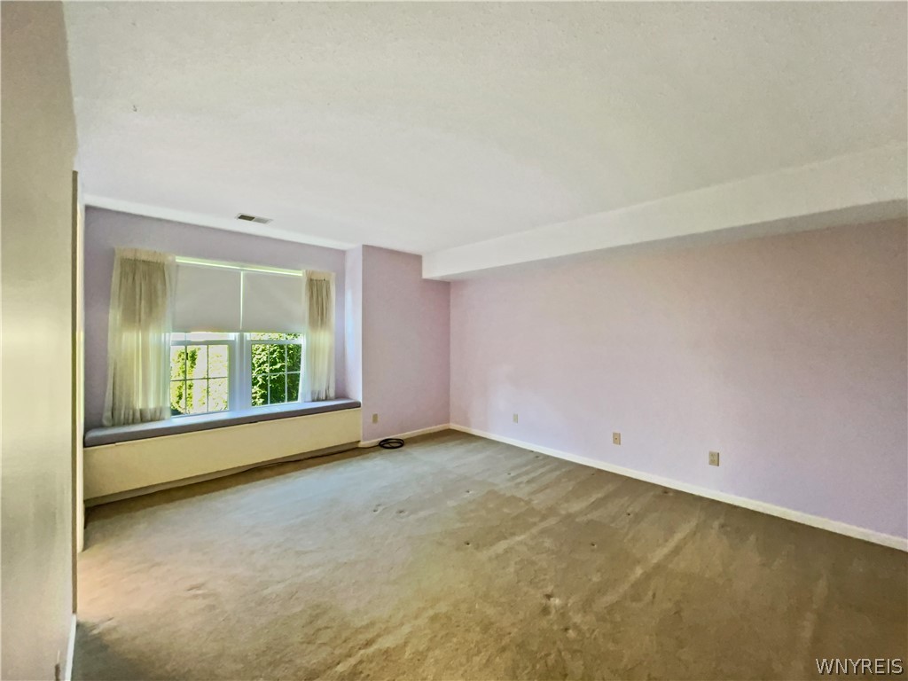 640 Youngs Road, Unit A Amherst, NY 14221 - Photo 17 of 34 Master bedroom