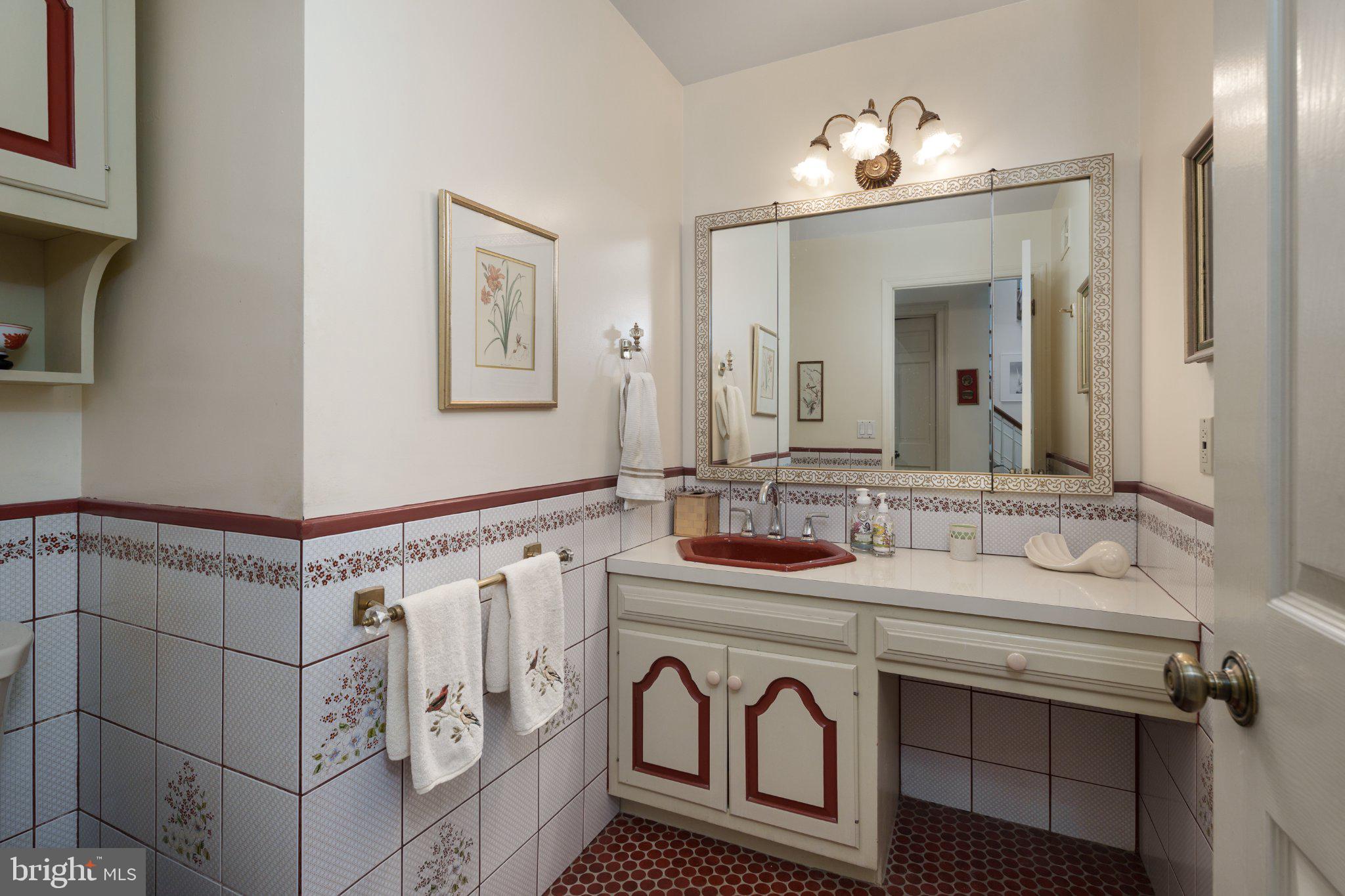 338 Gallup Road Princeton, NJ 08540 - Photo 29 of 53 a bathroom with double vanity sink and a mirror
