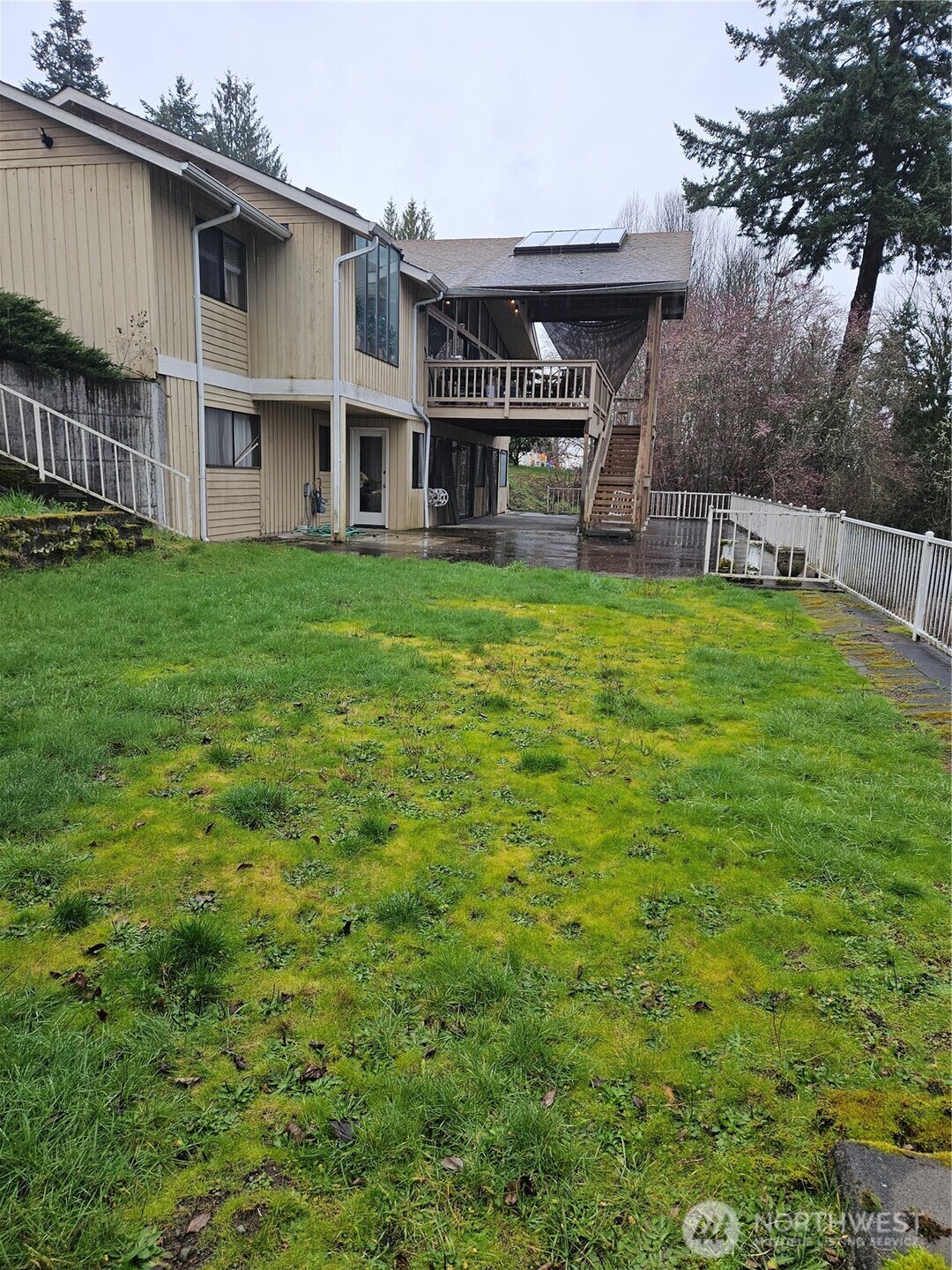2405 Terrace Drive Puyallup, WA 98372 - Photo 2 of 8 a view of a house with a yard
