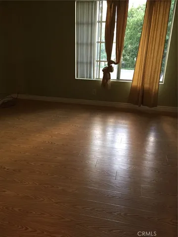 a view of a room with a window