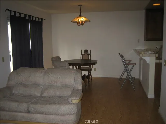 a lamp is sitting on a table in a room