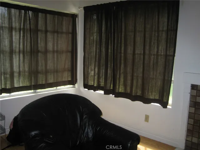 a dining table chair with dishwasher in it
