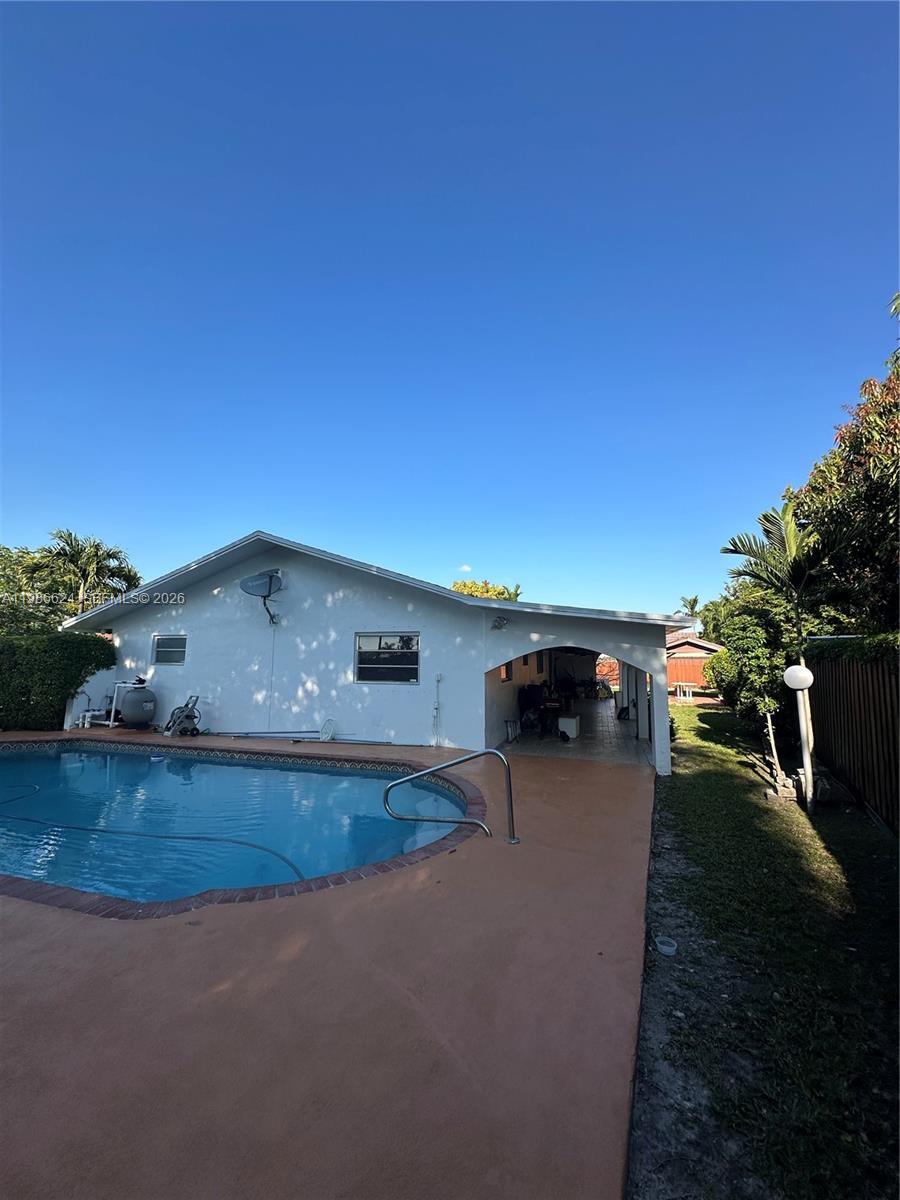 9814 Southwest 4th Terrace Miami, FL 33174 - Photo 6 of 10 a view of a terrace with a garden