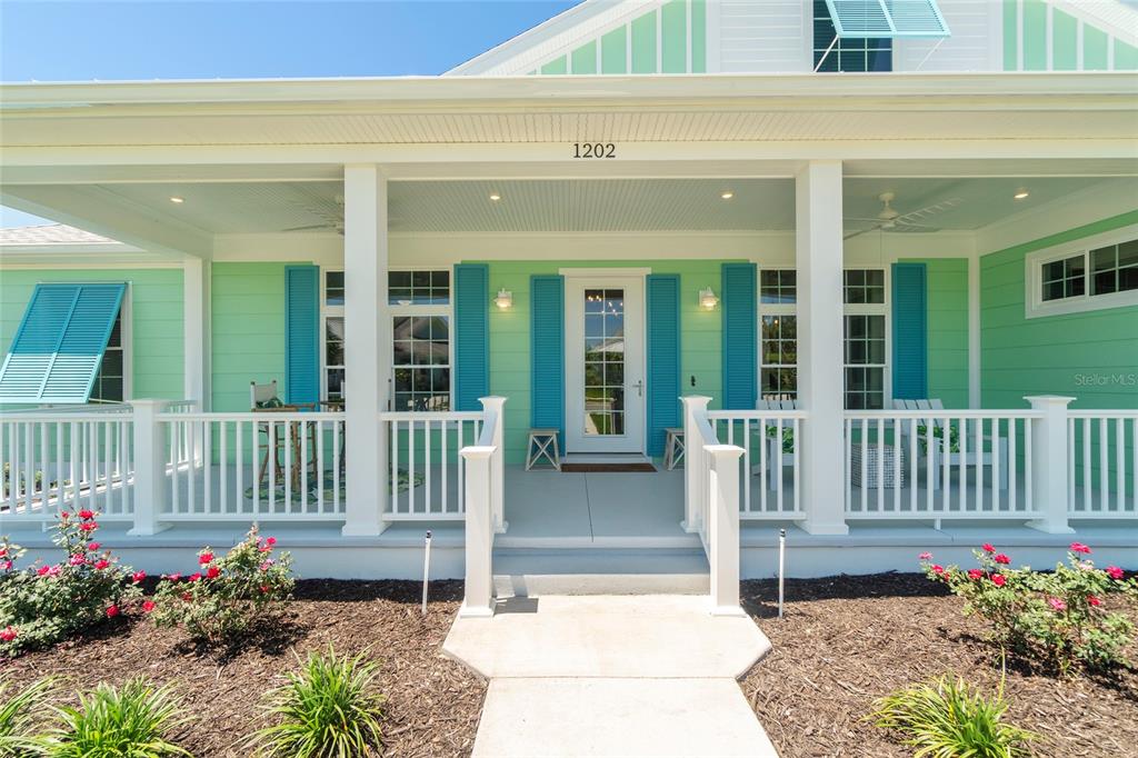 1202 Fiesta Key Circle Lady Lake, FL 32159 - Photo 1 of 1 a view of a house with a porch