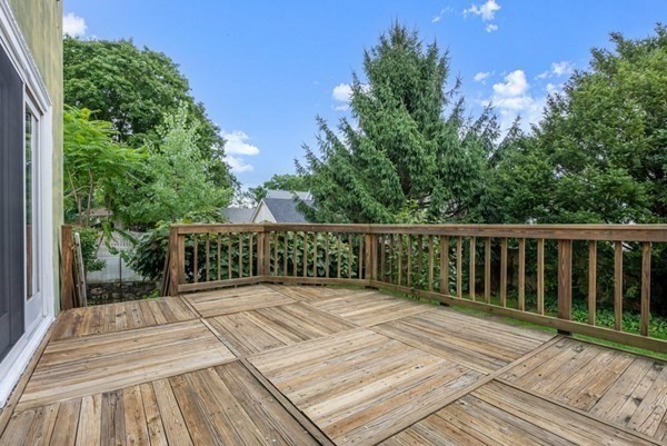 7 Pleasant Street Wellesley, MA 02482 - Photo 17 of 23 a view of a wooden floor