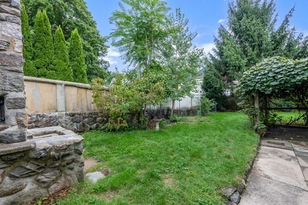 7 Pleasant Street Wellesley, MA 02482 - Photo 19 of 23 a view of backyard with patio