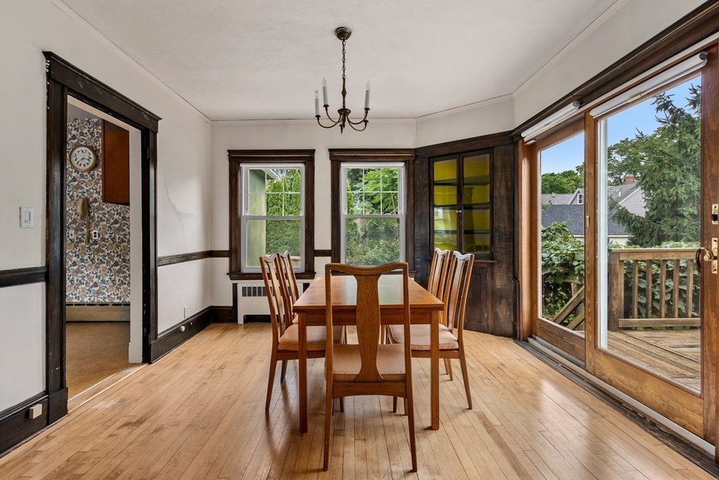 7 Pleasant Street Wellesley, MA 02482 - Photo 7 of 23 a dining room with furniture window wooden floor