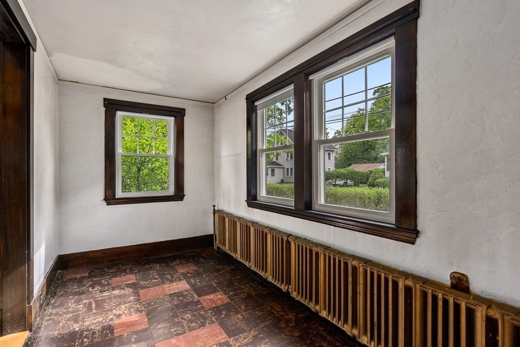 7 Pleasant Street Wellesley, MA 02482 - Photo 10 of 23 a view of a hallway with windows