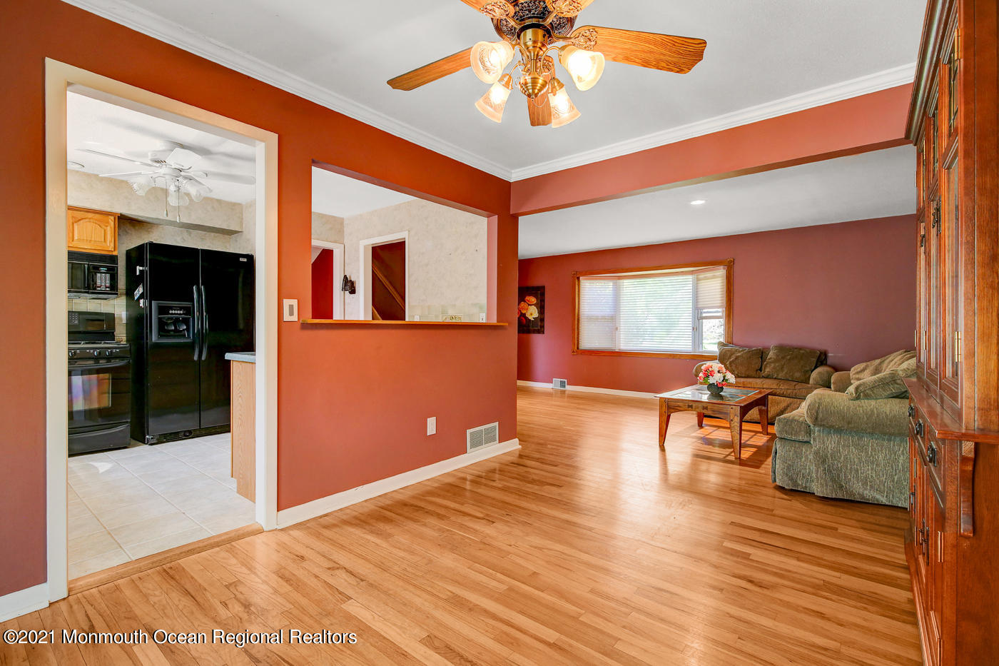 6 Hall Road Freehold, NJ 07728 - Photo 23 of 36 a living room with furniture and a wooden floor