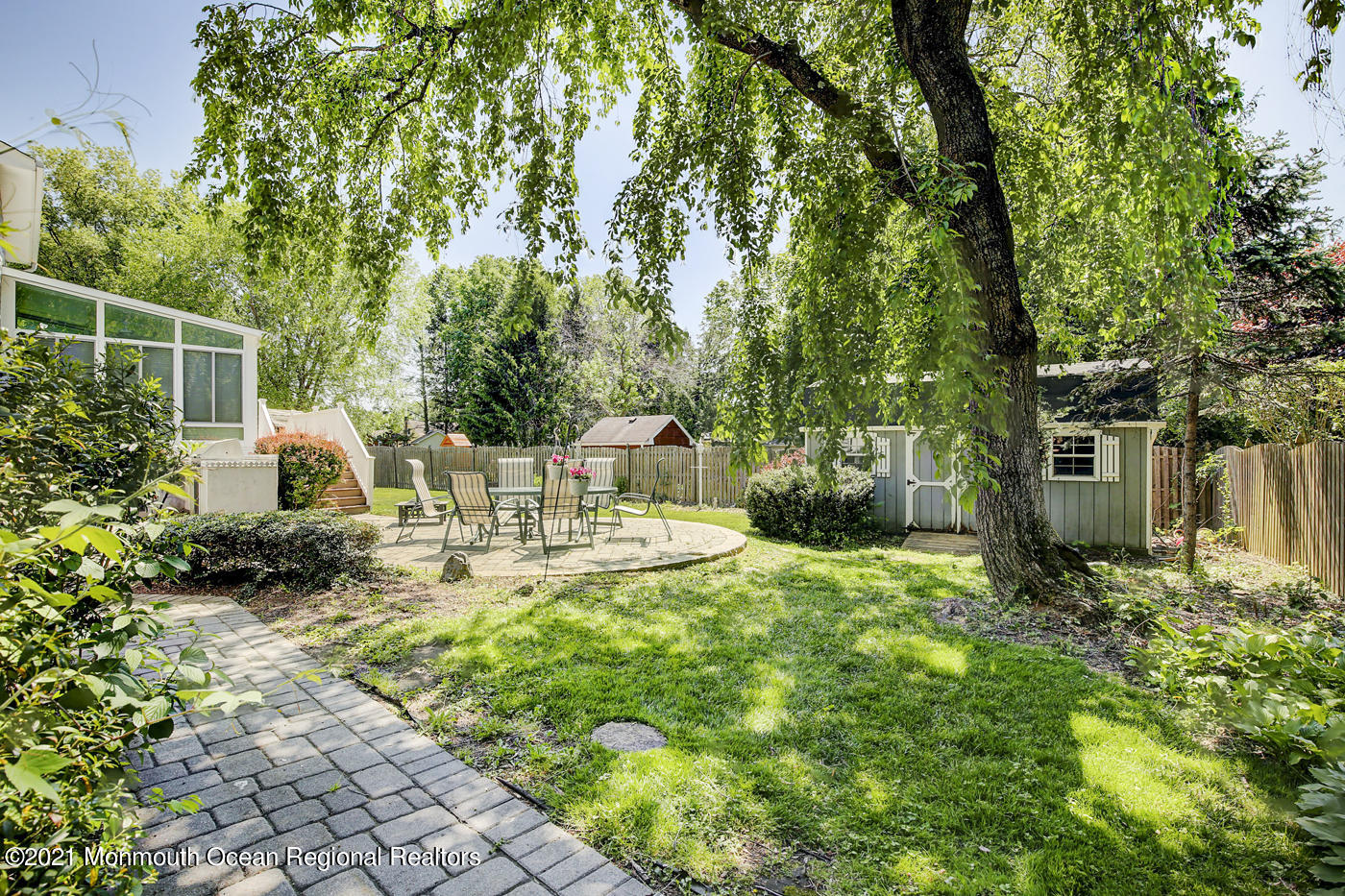 6 Hall Road Freehold, NJ 07728 - Photo 4 of 36 a view of an house with backyard space and garden