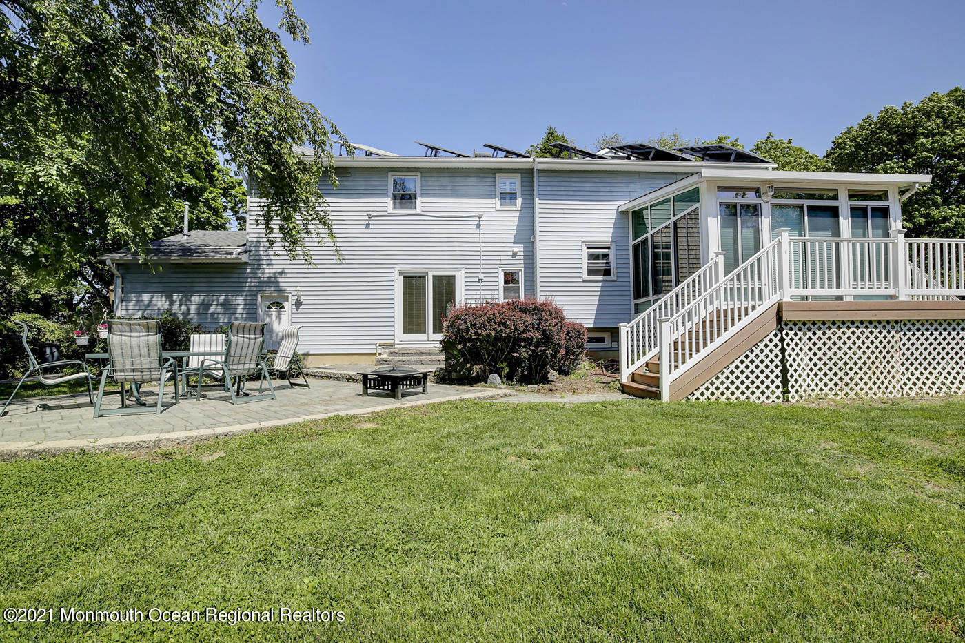 6 Hall Road Freehold, NJ 07728 - Photo 5 of 36 a front view of a house with a garden
