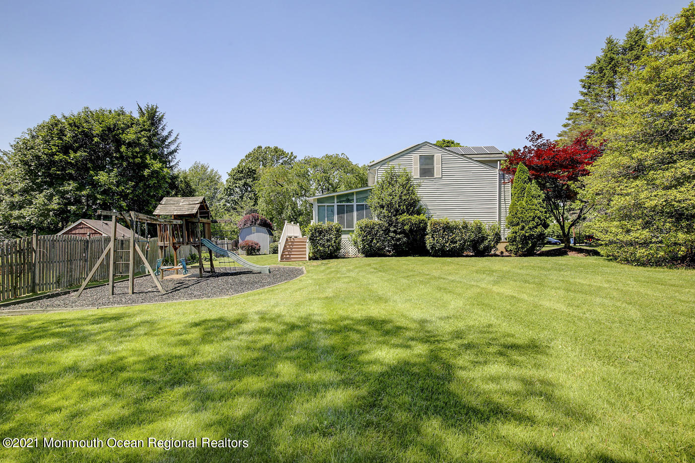 6 Hall Road Freehold, NJ 07728 - Photo 6 of 36 a view of a house with backyard and sitting area