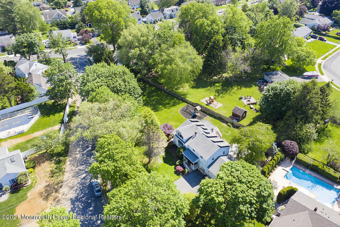 6 Hall Road Freehold, NJ 07728 - Photo 7 of 36 an aerial view of residential house with outdoor space and swimming pool