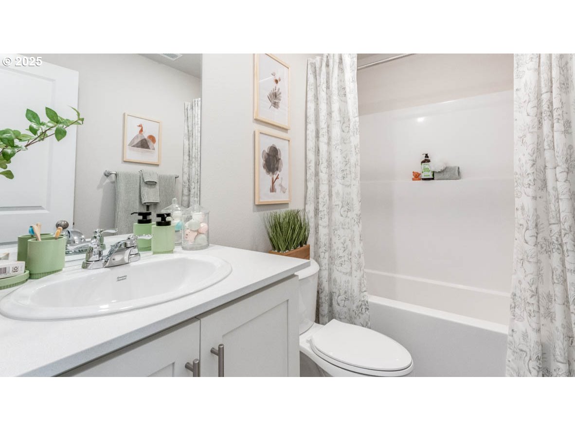 3441 Southwest Hartley Avenue Gresham, OR 97080 - Photo 17 of 28 a bathroom with a sink toilet and shower