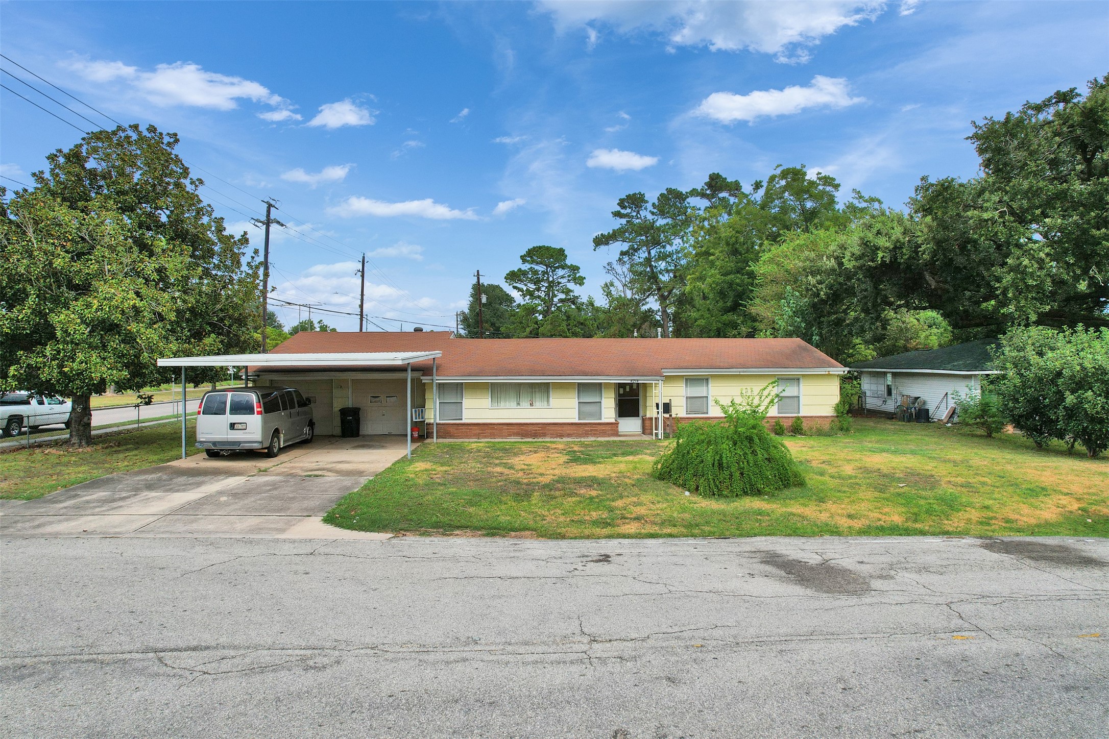 4214 Galway Lane Houston, TX 77080 - Photo 13 of 13 a front view of a house with a garden