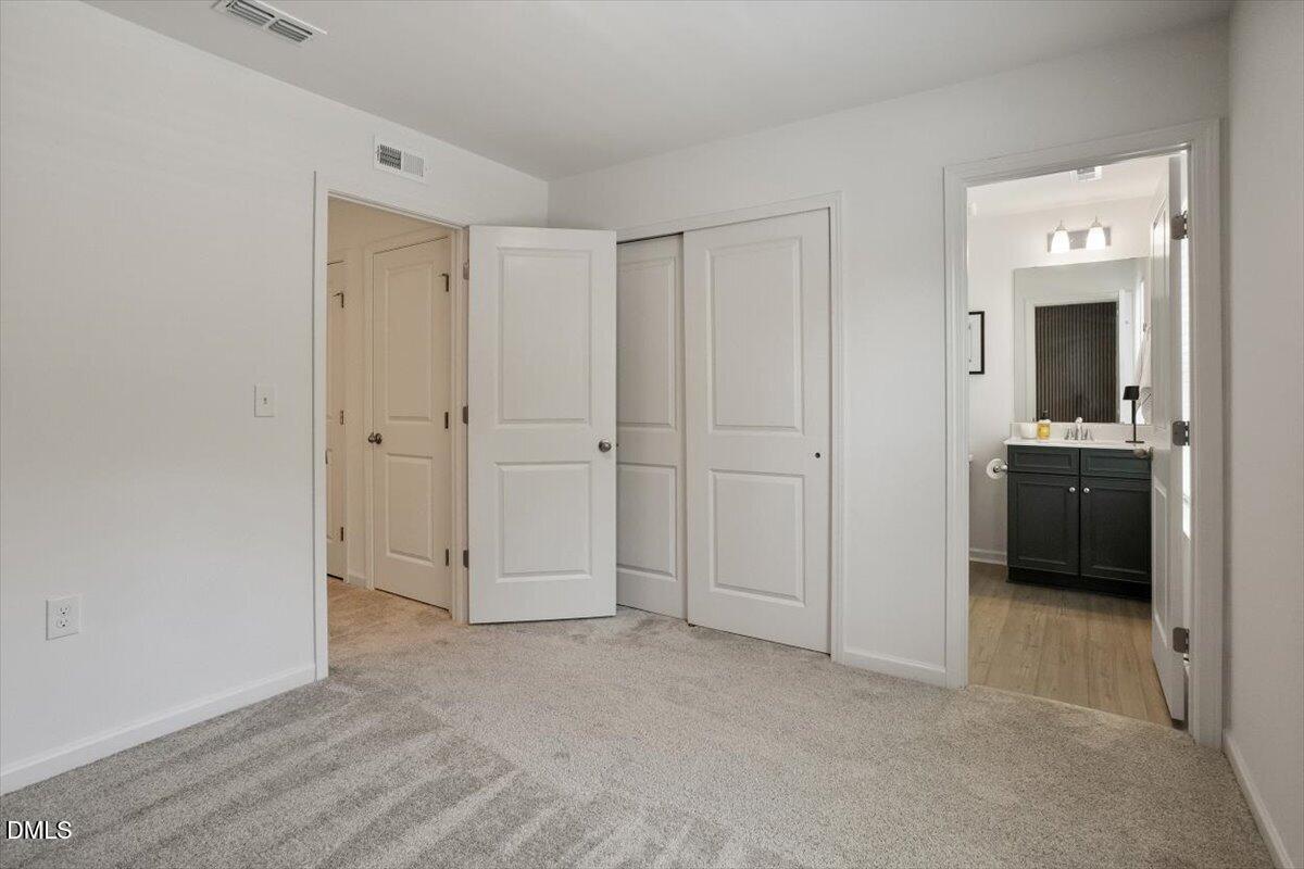 517 Hacksaw Trail Raleigh, NC 27610 - Photo 16 of 20 a view of a bathroom with a sink and a