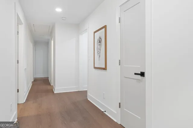 a view of a hallway with closet area