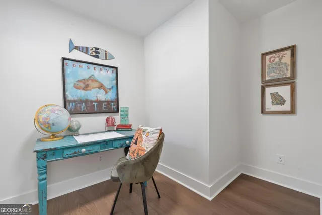 a view of a workspace with furniture