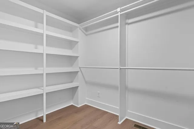 a view of an empty walk in closet