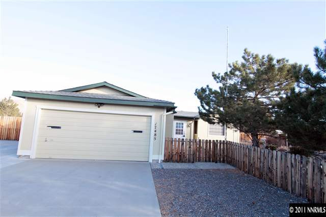17485 Fantail Street Reno, NV 89508 - Photo 1 of 13 a view of a house with a yard