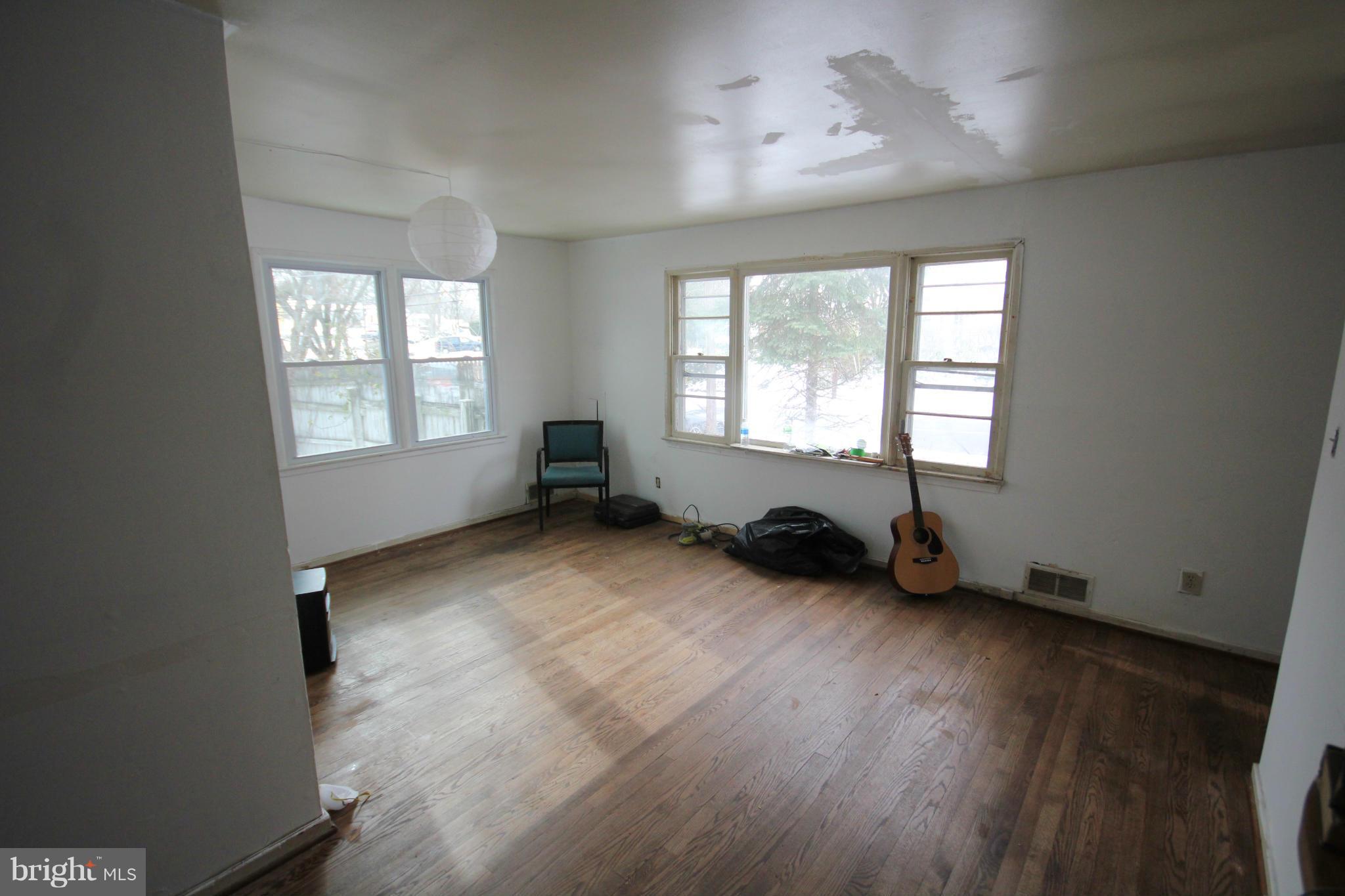 12305 Bluhill Road Silver Spring, MD 20902 - Photo 2 of 4 a view of an empty room and window