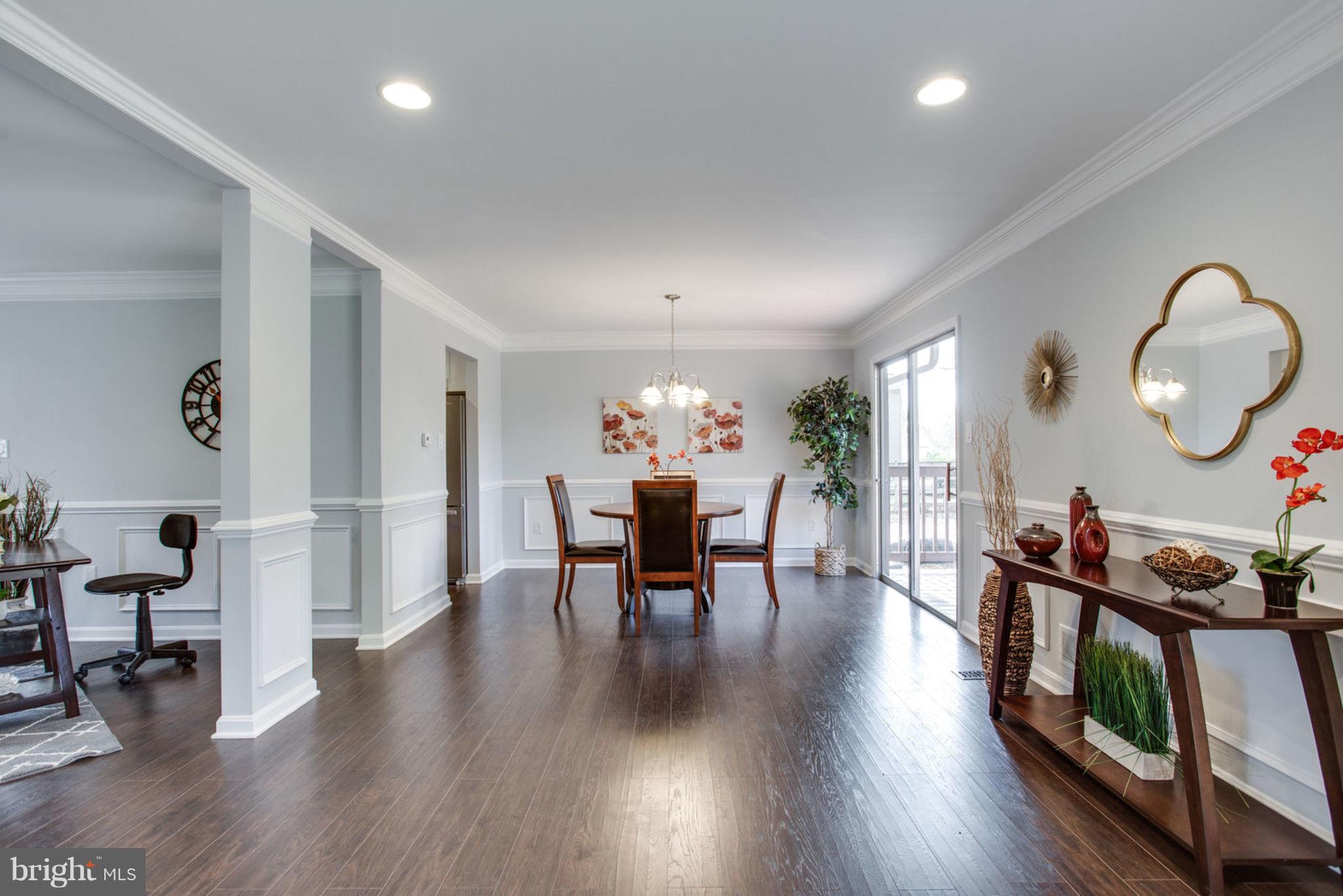 14312 Sturtevant Road Silver Spring, MD 20905 - Photo 11 of 43 a view of a dining room with furniture and wooden floor