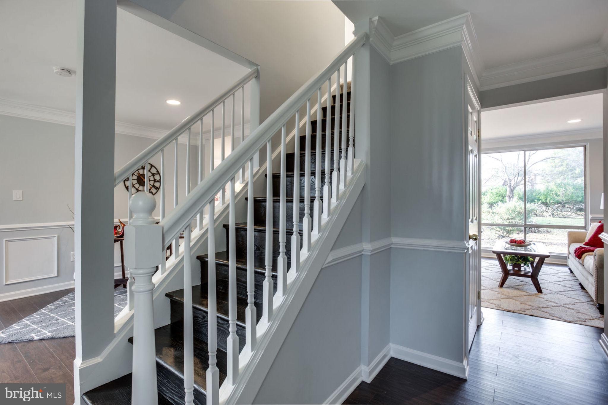 14312 Sturtevant Road Silver Spring, MD 20905 - Photo 3 of 43 a view of entryway and hall with wooden floor