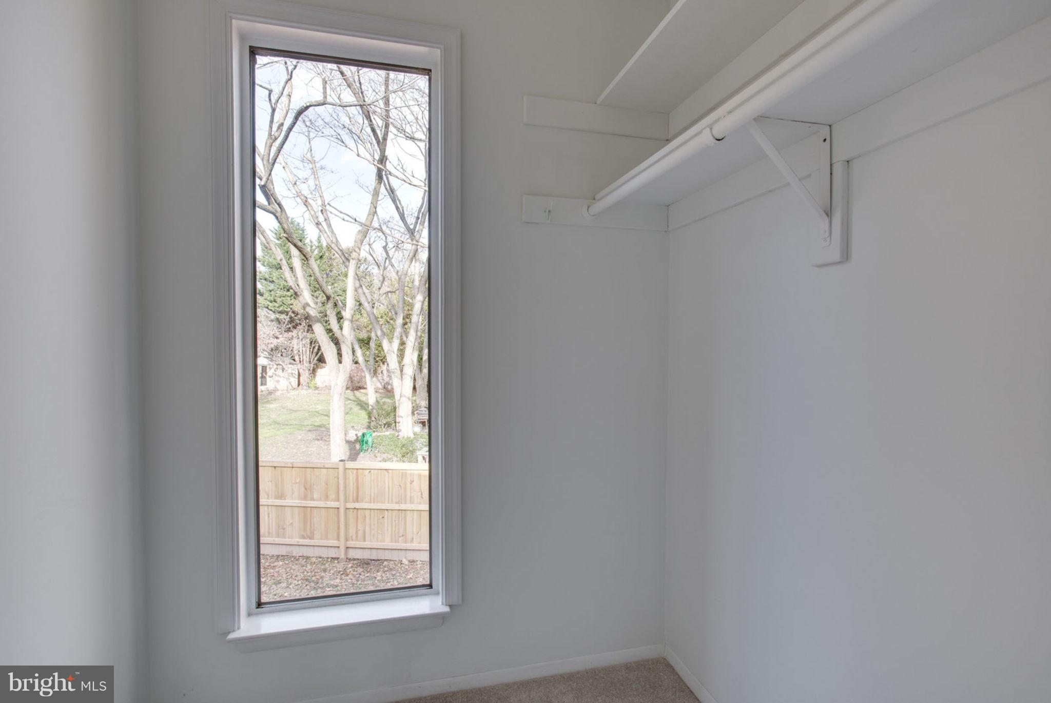 14312 Sturtevant Road Silver Spring, MD 20905 - Photo 23 of 43 an empty room with windows