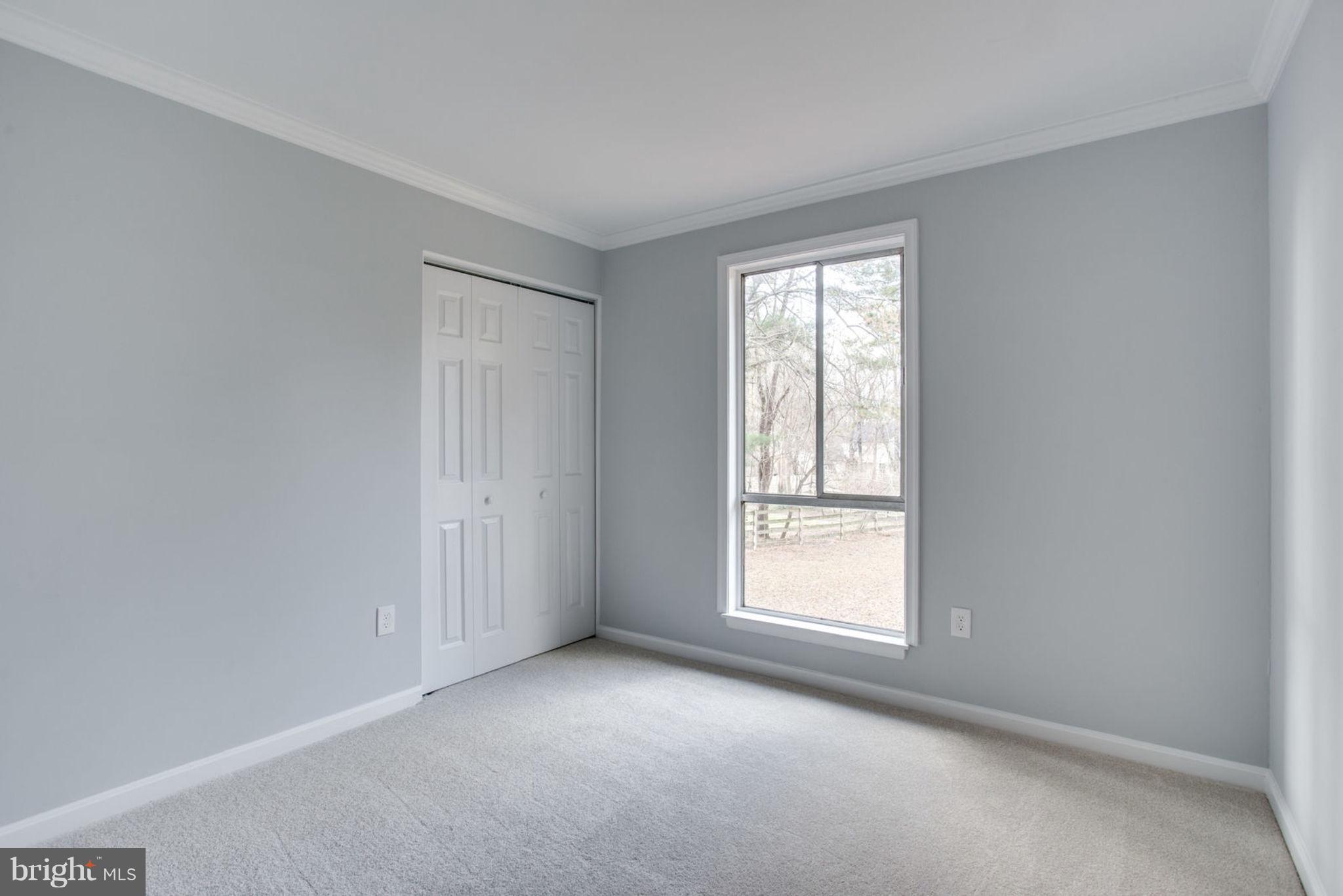 14312 Sturtevant Road Silver Spring, MD 20905 - Photo 26 of 43 an empty room with a window