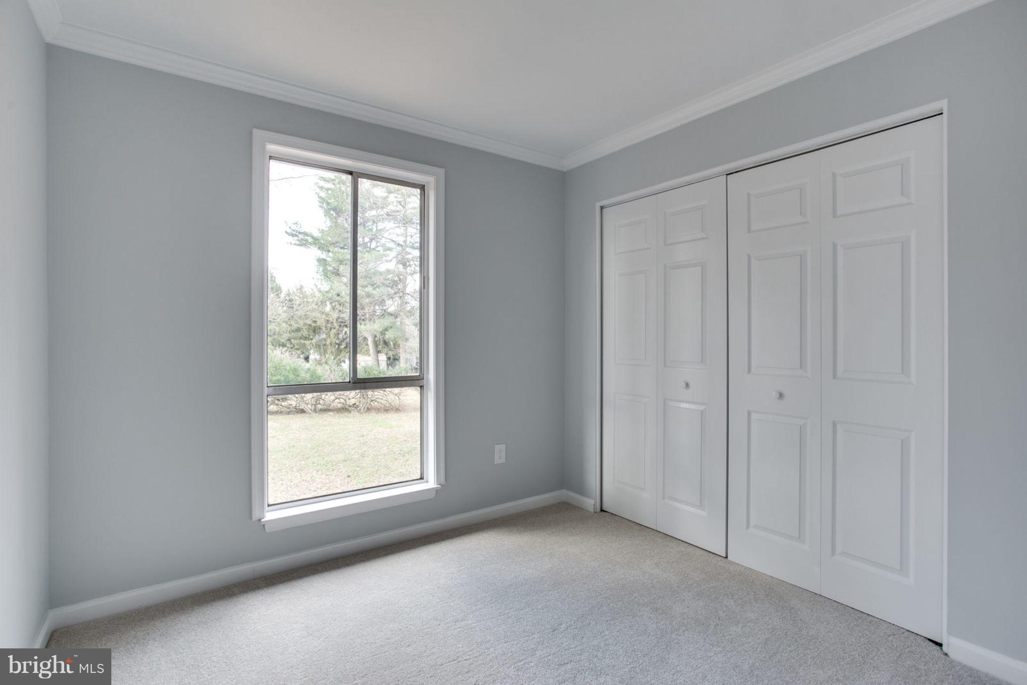 14312 Sturtevant Road Silver Spring, MD 20905 - Photo 27 of 43 a view of an empty room with a window