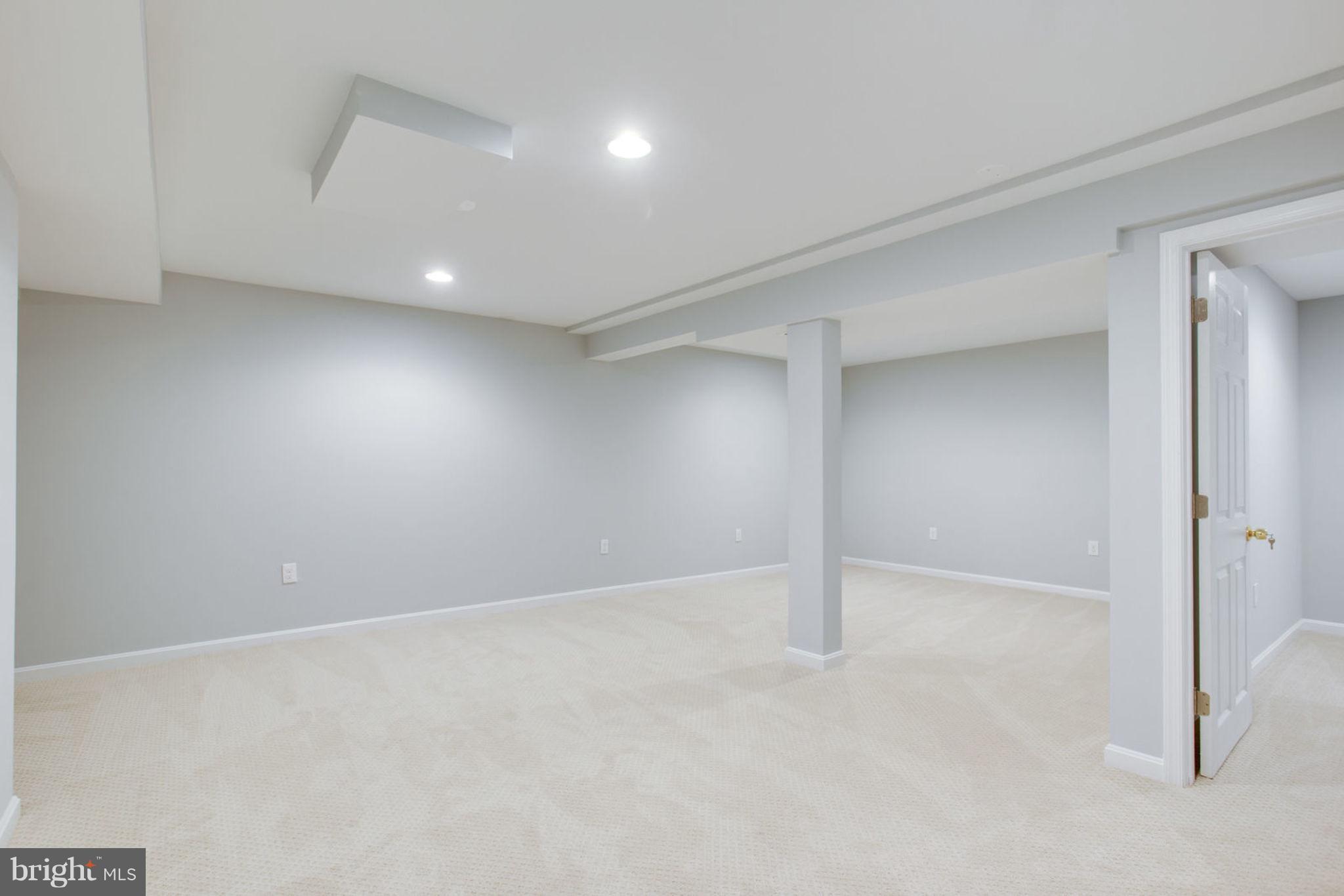 14312 Sturtevant Road Silver Spring, MD 20905 - Photo 31 of 43 an empty room with an entryway