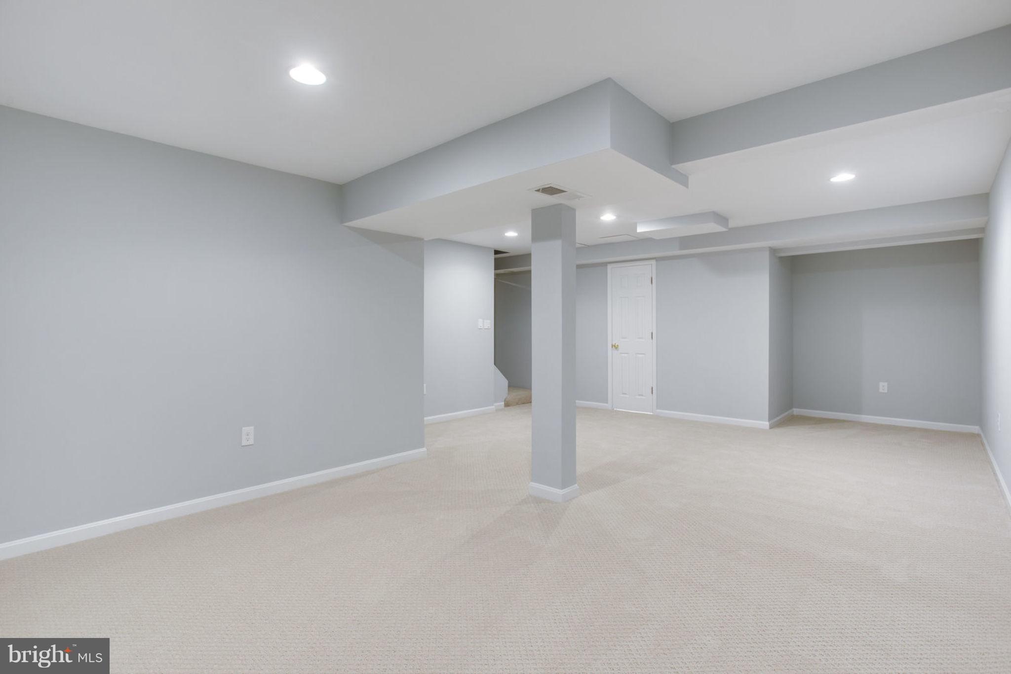 14312 Sturtevant Road Silver Spring, MD 20905 - Photo 34 of 43 an empty room with an entryway