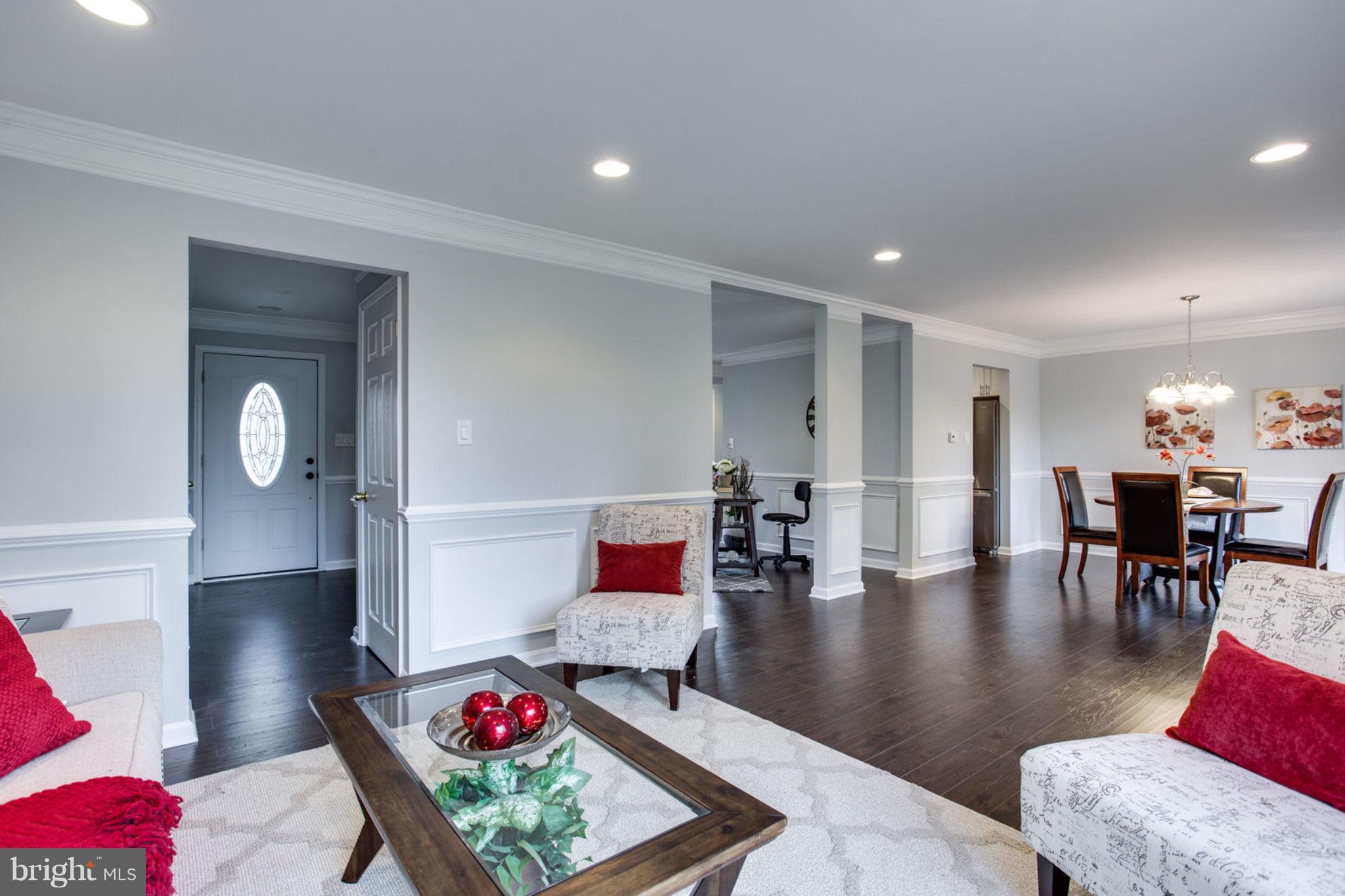 14312 Sturtevant Road Silver Spring, MD 20905 - Photo 10 of 43 a living room with furniture and wooden floor