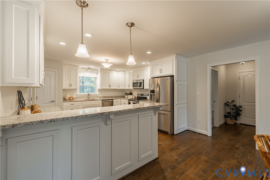 6720 Claiborne Road Sutherland, VA 23885 - Photo 9 of 35 Kitchen with white shaker cabinetry, stainless ste