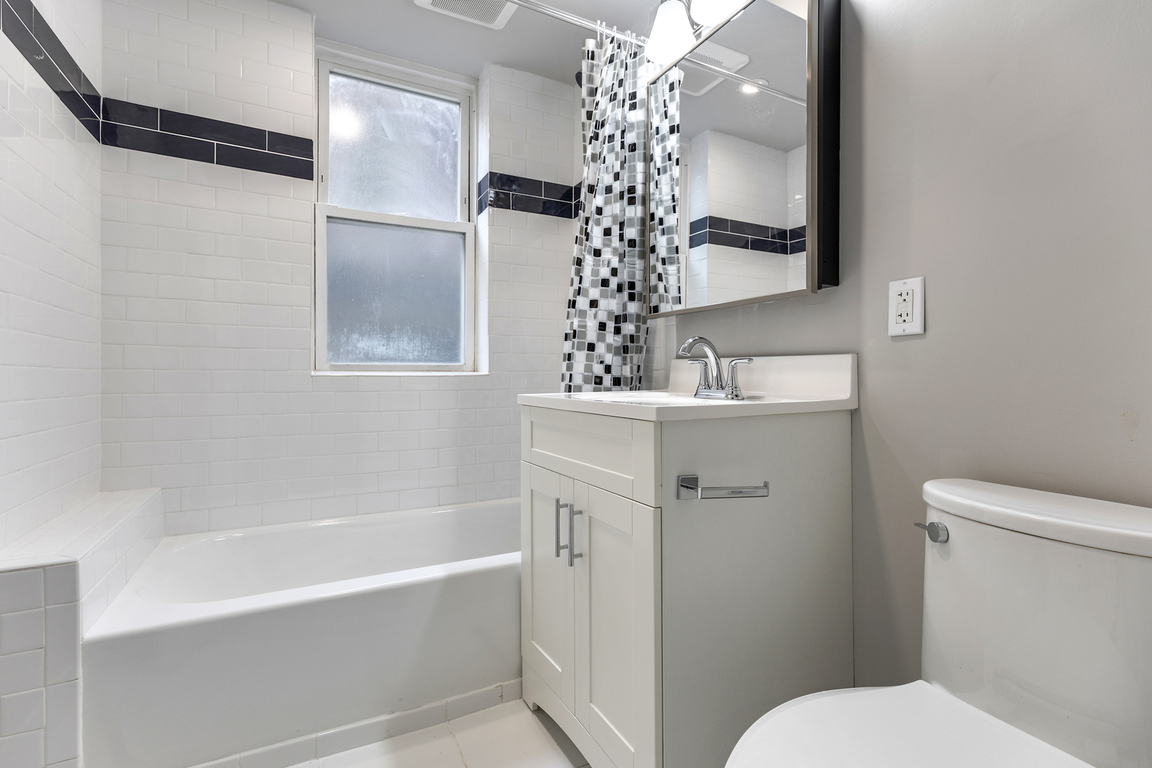 1032 North Austin Boulevard, Unit 1N Oak Park, IL 60302 - Photo 11 of 16 a bathroom with a sink toilet and shower