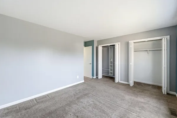 an empty room with closet