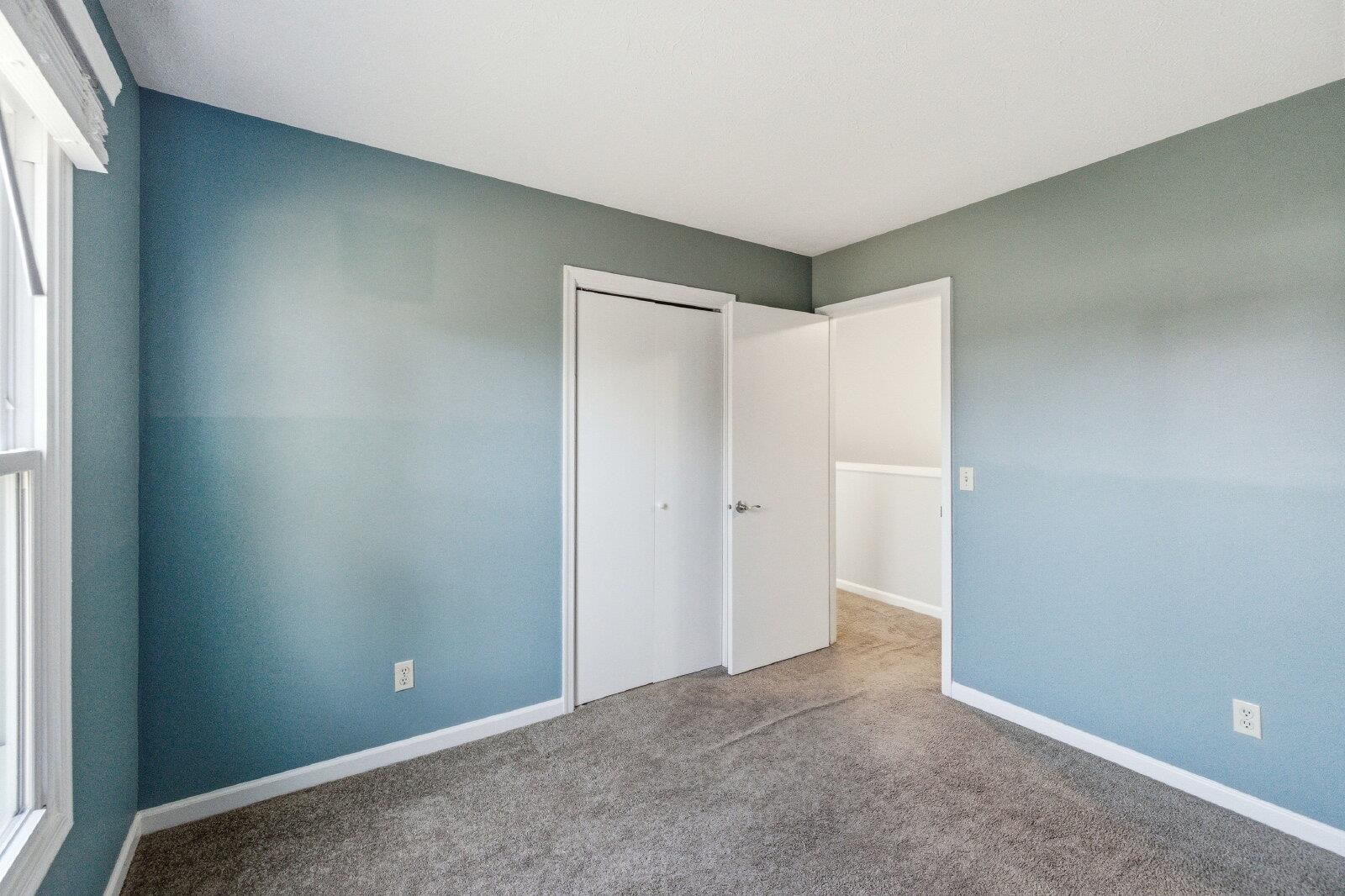 830 Vine Street Harrisonburg, VA 22802 - Photo 25 of 34 an empty room with windows and closet