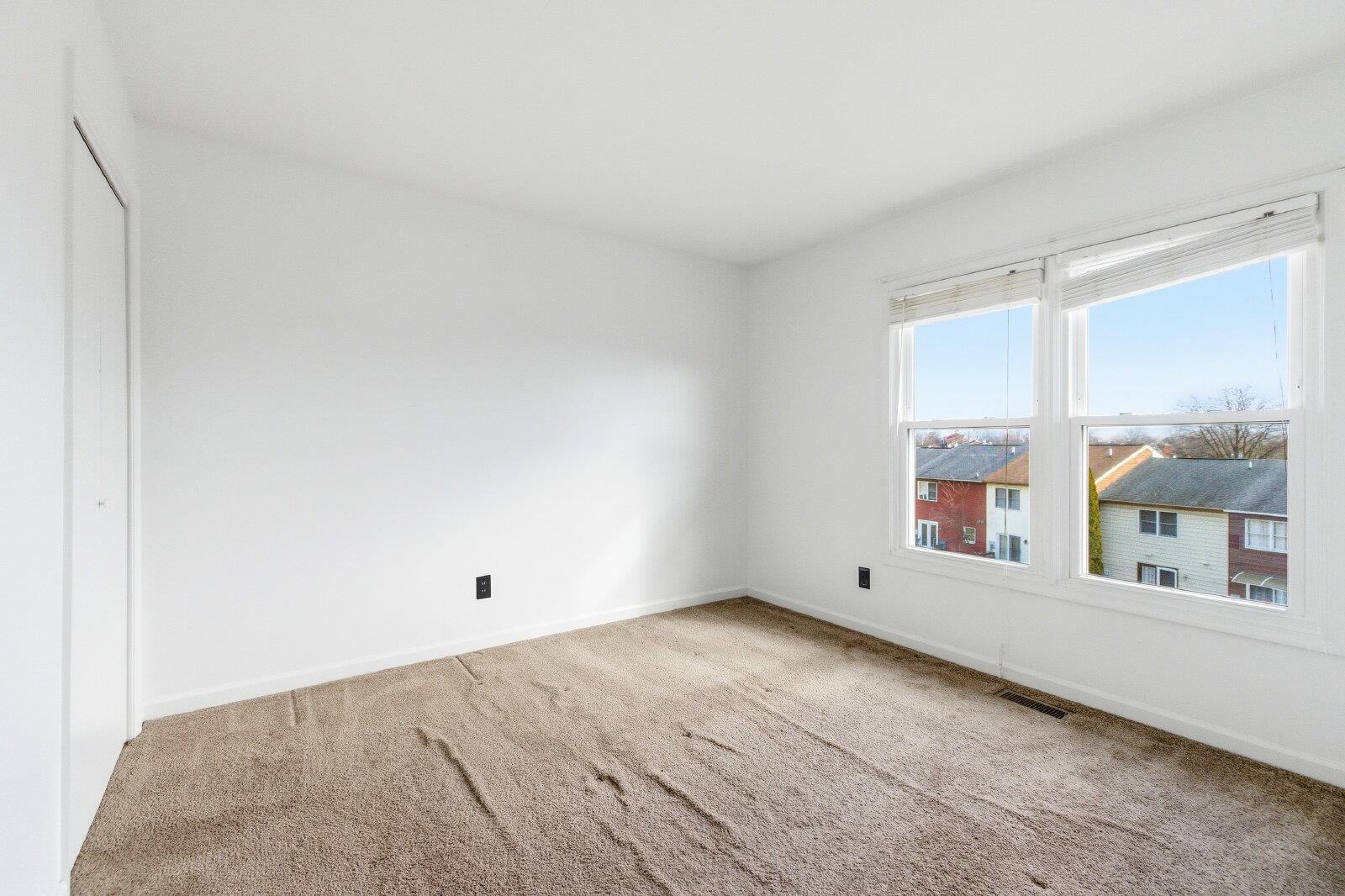 830 Vine Street Harrisonburg, VA 22802 - Photo 26 of 34 a view of an empty room with a window