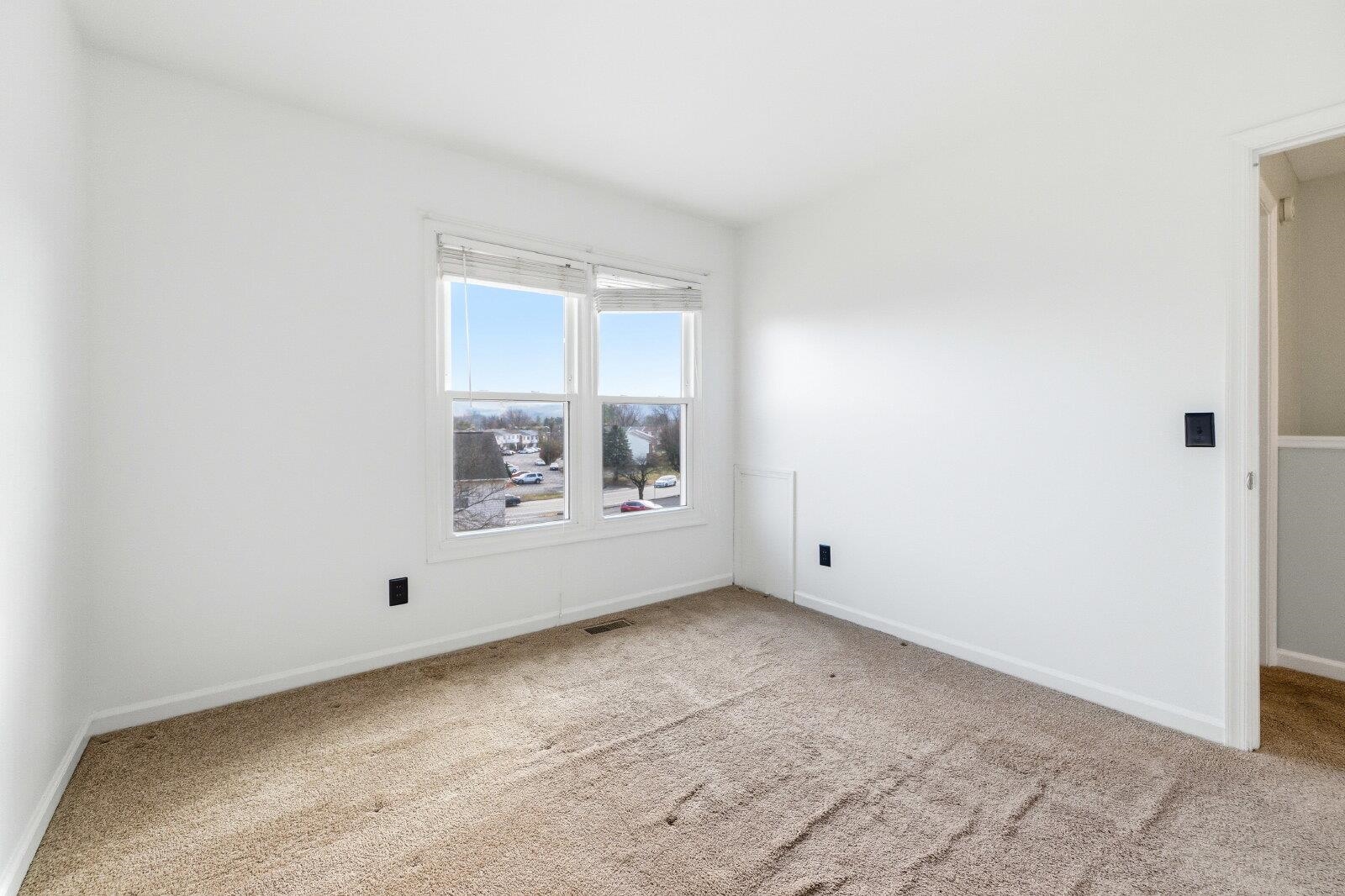 830 Vine Street Harrisonburg, VA 22802 - Photo 27 of 34 a view of an empty room with a window