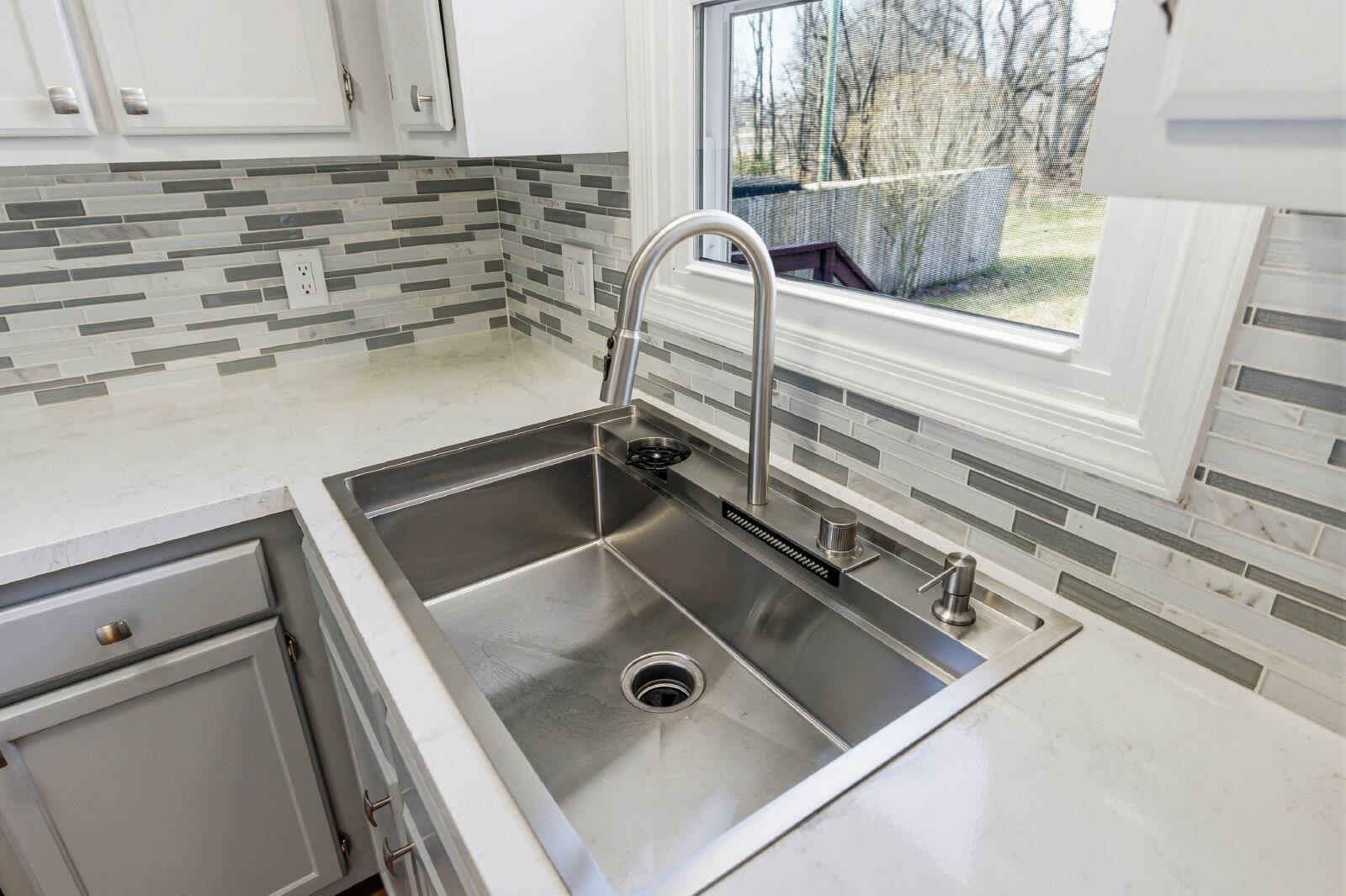 830 Vine Street Harrisonburg, VA 22802 - Photo 9 of 34 a close view of sink and tap