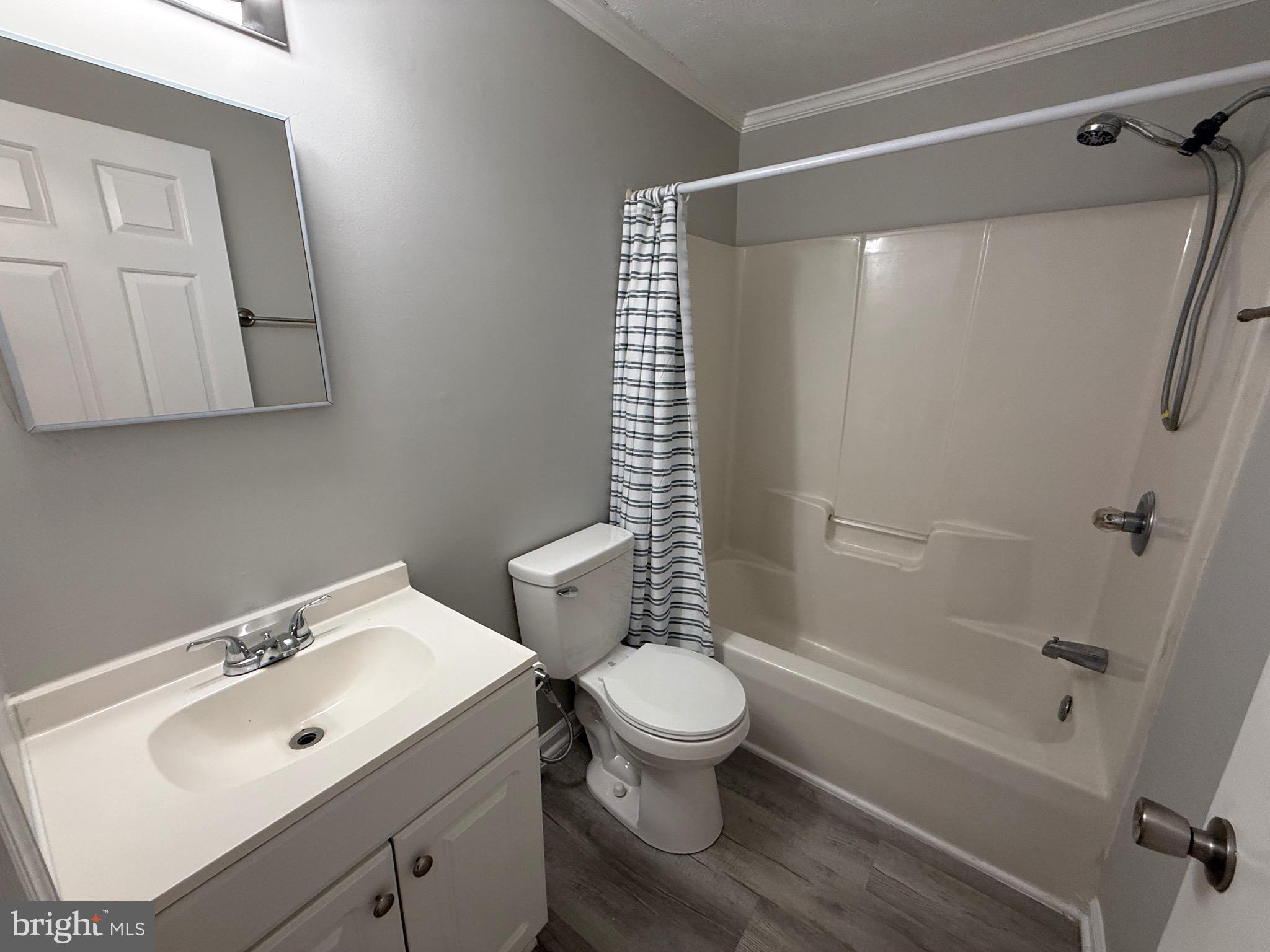 299 Blue Crab Loop Montross, VA 22520 - Photo 19 of 30 a bathroom with a sink toilet and shower