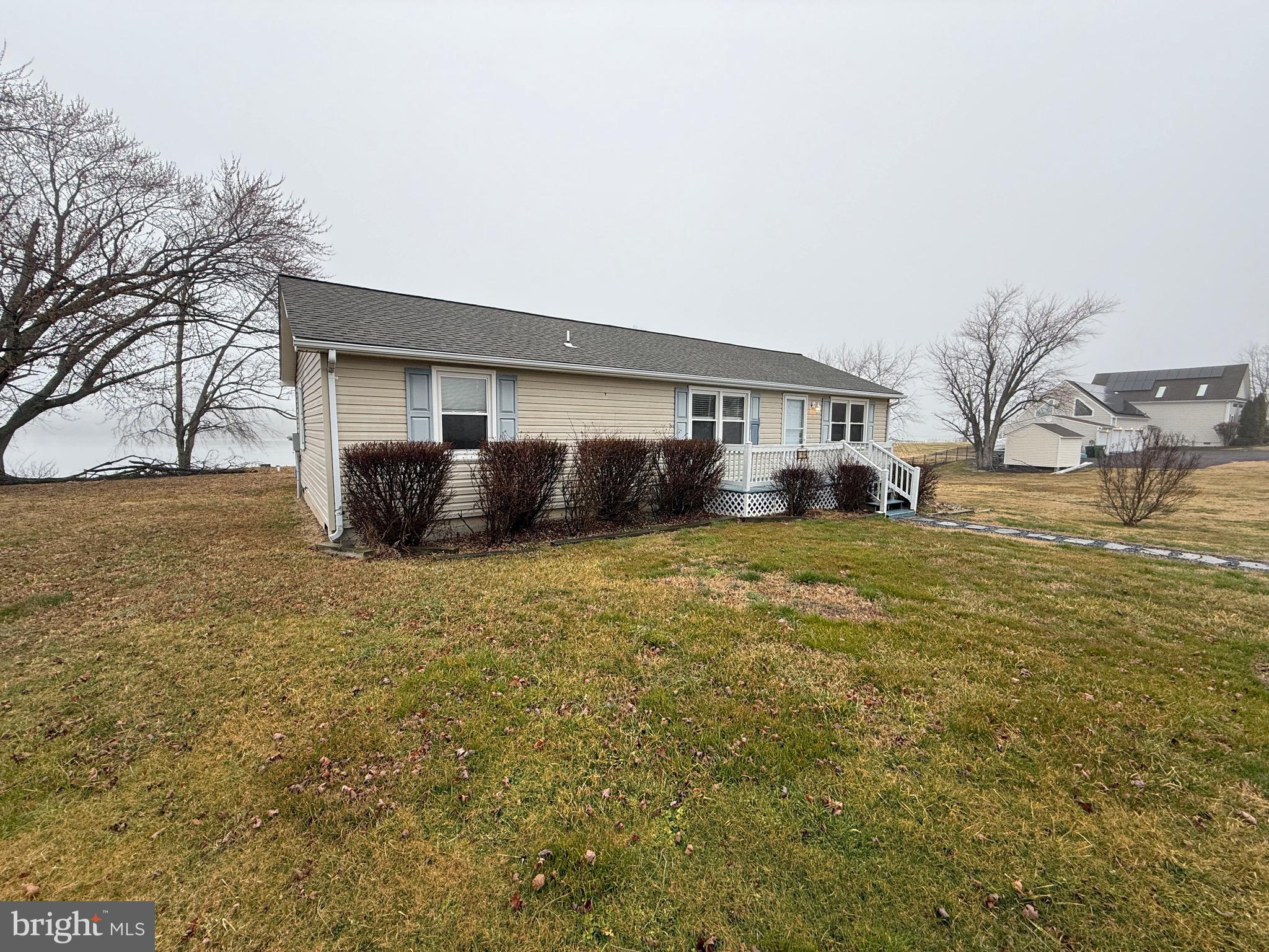 299 Blue Crab Loop Montross, VA 22520 - Photo 28 of 30 a house view with a garden space