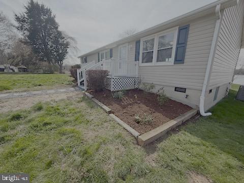 299 Blue Crab Loop Montross, VA 22520 - Photo 7 of 30 a view of a house with a backyard