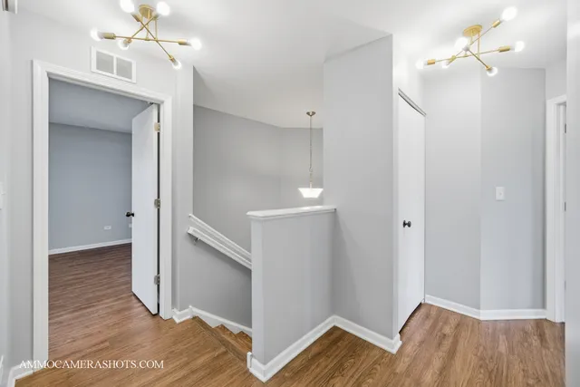 a view of livingroom with hardwood floor and ceiling fan