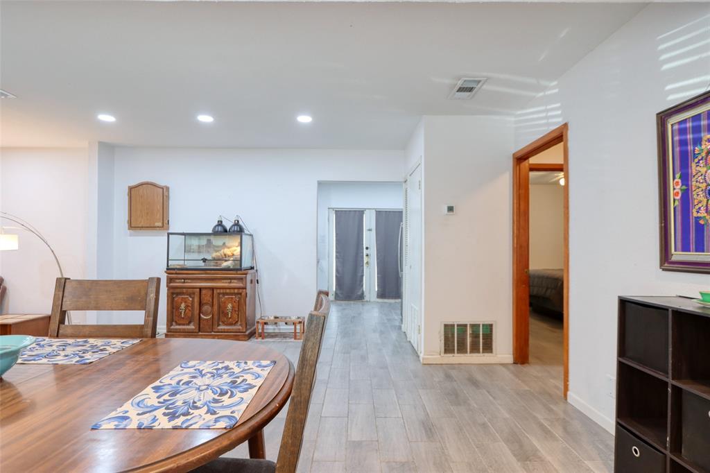 305 East Belt Line Road Wilmer, TX 75172 - Photo 15 of 16 a view of a livingroom with furniture wooden floor and a rug