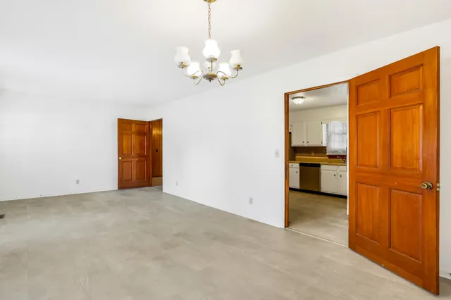 a view of a kitchen with a sink cabinet and a kitchen