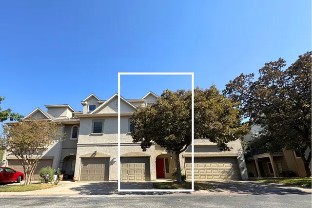 a front view of a house with street
