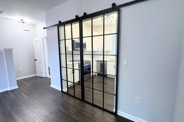 a view of entryway with wooden floor