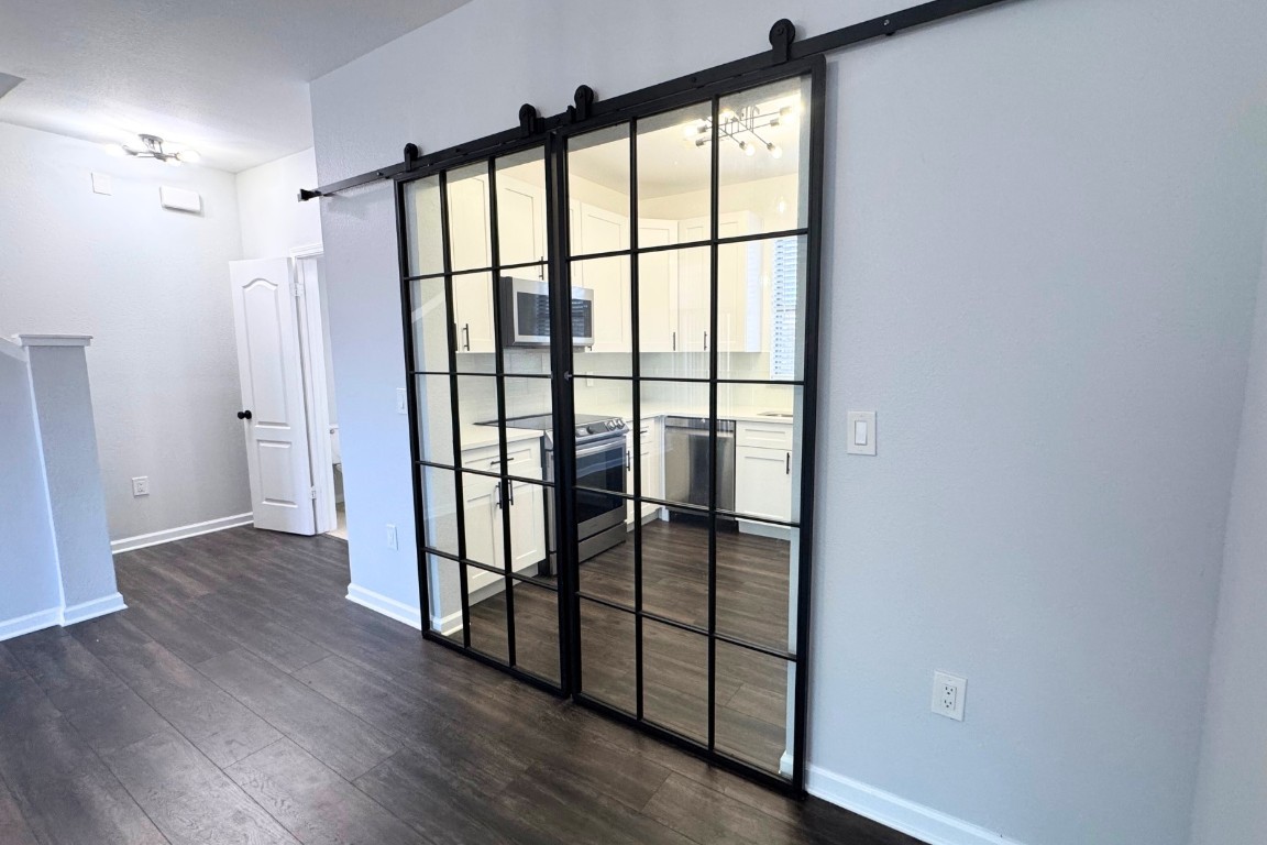 11203 Ranch Road 2222, Unit 2203 Austin, TX 78730 - Photo 16 of 34 a view of entryway with wooden floor