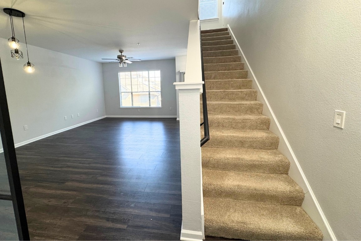11203 Ranch Road 2222, Unit 2203 Austin, TX 78730 - Photo 20 of 34 a view of entryway and hall with wooden floor